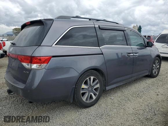 2015 Honda Odyssey Touring Elite with VIN 5FNRL5H95FB058873, listed as a Copart auction lot 53744295 with 139,856 mi miles and Salvage title. Bid and sale history available at DreamBid. Image 3.