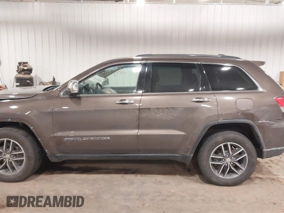 2018 Jeep Grand Cherokee Limited with VIN 1C4RJFBG2JC139502, listed as a IAAI auction lot 41372877 with 145,877 mi miles and . Bid and sale history available at DreamBid. Image 13.