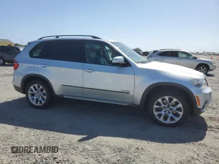 2012 BMW X5 35i with VIN 5UXZV4C5XCL751020, listed as a Copart auction lot 59327845 with 106,249 mi miles and Salvage title. Bid and sale history available at DreamBid. Image 4.
