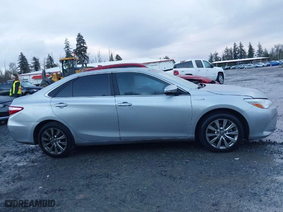 2016 Toyota Camry Hybrid LE with VIN 4T1BD1FK1GU188991, listed as a IAAI auction lot 41302192 with 89,311 mi miles. Bid and sale history available at carsss.com. Image 13.