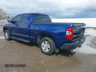 2014 Toyota Tundra SR with VIN 5TFUM5F17EX056082, listed as a IAAI auction lot 41884095 with 155,036 mi miles and . Bid and sale history available at DreamBid. Image 3.