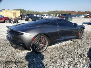2021 McLaren GT z VIN SBM22GCA8MW001374, wystawiony jako Copart lot #82147064 z przebiegiem 32 562 mil mil oraz Nie do naprawy. Historia ofert i sprzedaży dostępna na DreamBid. Obrazek 3.