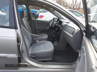 2001 Kia Rio with VIN KNADC123716042067, listed as a IAAI auction lot 41449479 with 113,108 mi miles. Bid and sale history available at carsss.com. Image 5.