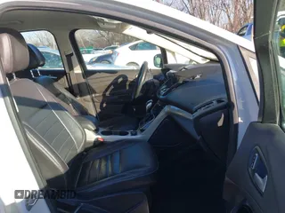 2016 Ford C-Max SEL z VIN 1FADP5CU2GL118381, wystawiony jako IAAI lot #41516426 z przebiegiem 220 361 mil mil oraz . Historia ofert i sprzedaży dostępna na DreamBid. Obrazek 5.