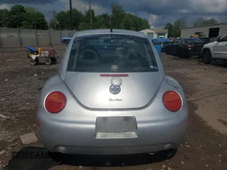 2001 Volkswagen Beetle GLX with VIN 3VWDD21C21M406898, listed as a Copart auction lot 55597675 with 104,597 mi miles and Salvage Title. Bid and sale history available at DreamBid. Image 6.