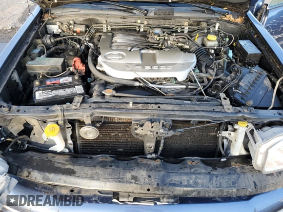 2001 Nissan Pathfinder LE z VIN JN8DR07Y81W520629, wystawiony jako Copart lot #86607374 z przebiegiem 112 216 mil mil oraz Szkoda całkowita • Salvage title. Historia ofert i sprzedaży dostępna na DreamBid. Obrazek 12.