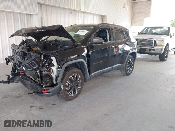 2020 Jeep Compass Trailhawk with VIN 3C4NJDDB3LT170463, listed as a IAAI auction lot 42446080 with 83,336 mi miles and . Bid and sale history available at DreamBid. Image 18.