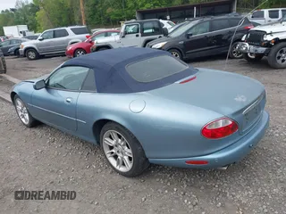 2002 Jaguar XK with VIN SAJDA42CX2NA28816, listed as a IAAI auction lot 42029672 with 130,978 mi miles and . Bid and sale history available at DreamBid. Image 3.