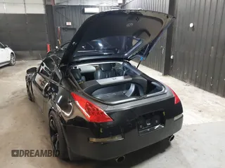 2005 Nissan 350Z Touring with VIN JN1AZ34E45M653631, listed as a IAAI auction lot 41689560 with 147,635 mi miles. Bid and sale history available at carsss.com. Image 3.