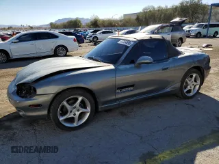 1999 Mazda MX-5 Miata z VIN JM1NB3531X0125572, wystawiony jako Copart lot #47254695 z przebiegiem 179 927 mil mil oraz Szkoda całkowita • Salvage title. Historia ofert i sprzedaży dostępna na DreamBid. Obrazek 1.