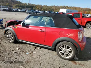 2013 MINI Convertible with VIN WMWZN3C58DT265980, listed as a Copart auction lot 77157154 with 88,975 mi miles and Salvage title. Bid and sale history available at DreamBid. Image 2.