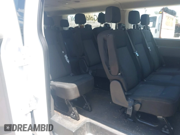 2020 Ford Transit Passenger XL z VIN 1FBAX2Y86LKA22944, wystawiony jako IAAI lot #42179762 z przebiegiem 102 295 mil mil oraz . Historia ofert i sprzedaży dostępna na DreamBid. Obrazek 8.