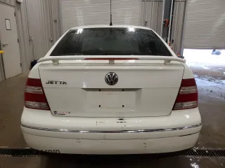 2004 Volkswagen Jetta GL with VIN 3VWRK69M54M098422, listed as a Copart auction lot 44006055 with 115,211 mi miles and Clean title. Bid and sale history available at DreamBid. Image 6.