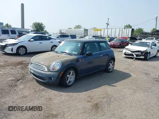 2010 MINI Hardtop with VIN WMWMF3C55ATZ64213, listed as a IAAI auction lot 42432622 with 124,913 mi miles and . Bid and sale history available at DreamBid. Image 2.