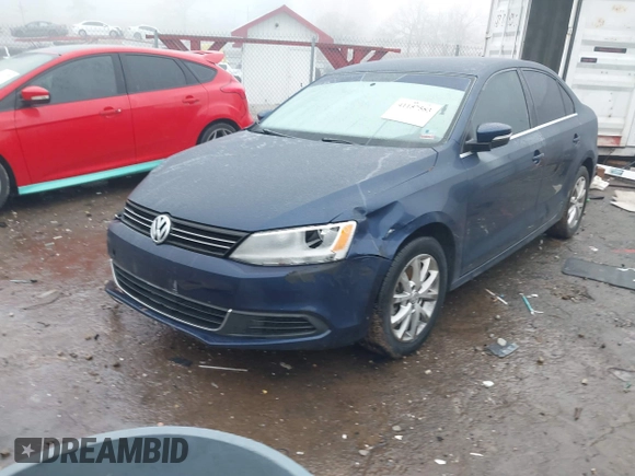 2013 Volkswagen Jetta SE z VIN 3VWDX7AJ3DM267839, wystawiony jako IAAI lot #41157583 z przebiegiem 61 643 mil mil oraz . Historia ofert i sprzedaży dostępna na DreamBid. Obrazek 18.