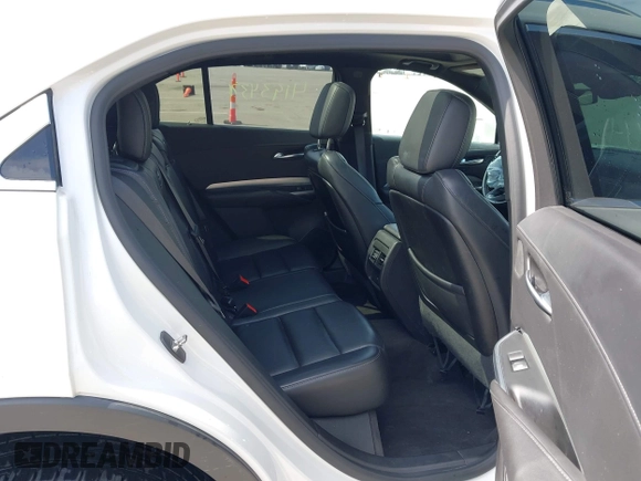 2020 Cadillac XT4 AWD Premium Luxury z VIN 1GYFZDR44LF036461, wystawiony jako IAAI lot #41934371 z przebiegiem 90 545 mil mil oraz . Historia ofert i sprzedaży dostępna na DreamBid. Obrazek 8.