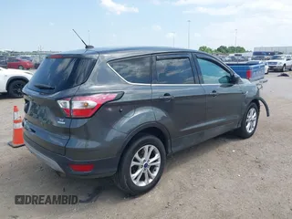 2017 Ford Escape SE z VIN 1FMCU0GD1HUE71410, wystawiony jako IAAI lot #42026516 z przebiegiem 173 804 mil mil oraz . Historia ofert i sprzedaży dostępna na DreamBid. Obrazek 4.