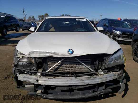 2014 BMW 7 Series 740Li xDrive with VIN WBAYF4C50ED281830, listed as a Copart auction lot 48557035 with 129,497 mi miles and Salvage Title. Bid and sale history available at carsss.com. Image 5.