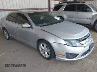 2012 Ford Fusion SE z VIN 3FAHP0HA4CR165202, wystawiony jako IAAI lot #42551662 z przebiegiem 120 127 mil mil oraz . Historia ofert i sprzedaży dostępna na DreamBid. Obrazek 1.
