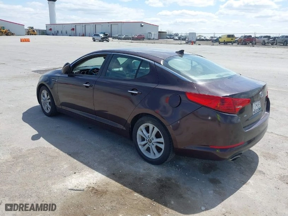 2011 Kia Optima EX with VIN KNAGN4A7XB5055304, listed as a IAAI auction lot 42023759 with 158,385 mi miles. Bid and sale history available at carsss.com. Image 3.