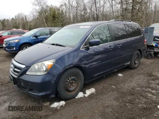 2007 Honda Odyssey EX with VIN 5FNRL38467B102180, listed as a Copart auction lot 52302215 with 374,291 mi miles and Clean Title. Bid and sale history available at carsss.com. Image 1.