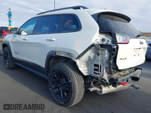 2019 Jeep Cherokee Trailhawk with VIN 1C4PJMBX0KD227083, listed as a IAAI auction lot 42120076 with 118,431 mi miles and . Bid and sale history available at DreamBid. Image 3.