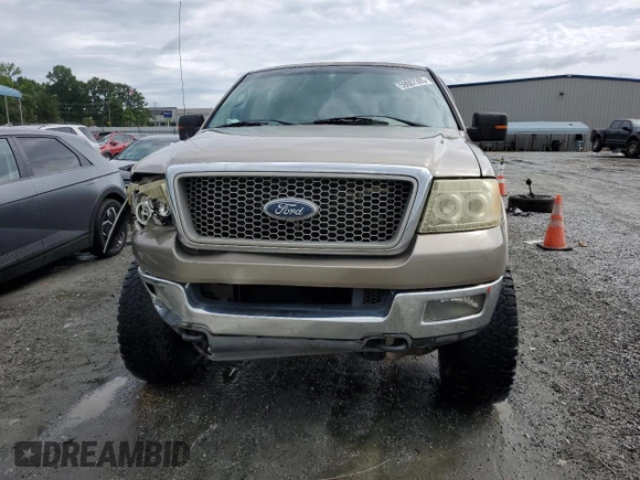 2004 Ford F-150 XLT with VIN 1FTPW14564KD21754, listed as a Copart auction lot 59007395 with 171,537 mi miles and Salvage title. Bid and sale history available at DreamBid. Image 5.
