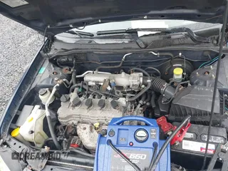 2005 Nissan Sentra S z VIN 3N1CB51D85L486835, wystawiony jako IAAI lot #42446684 z przebiegiem 99 818 mil mil oraz . Historia ofert i sprzedaży dostępna na DreamBid. Obrazek 10.