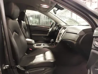 2014 Cadillac SRX with VIN 3GYFNAE34ES665630, listed as a IAAI auction lot 41315281 with 99,009 mi miles and . Bid and sale history available at DreamBid. Image 5.