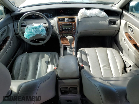 2000 Toyota Avalon XL with VIN 4T1BF28B2YU094407, listed as a Copart auction lot 48567255 with 114,434 mi miles and Salvage Title. Bid and sale history available at DreamBid. Image 8.