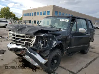 1994 Ford Bronco Custom with VIN 1FMEU15H7RLA79348, listed as a Copart auction lot 76497714 with 204,875 mi miles and Salvage Title. Bid and sale history available at carsss.com. Image 1.