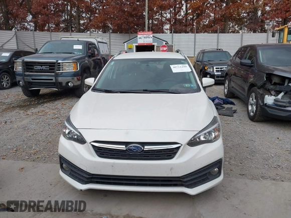 2020 Subaru Impreza Premium z VIN 4S3GTAV65L3706134, wystawiony jako IAAI lot #40711288 z przebiegiem 56 288 mil mil oraz . Historia ofert i sprzedaży dostępna na DreamBid. Obrazek 13.