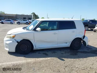 2013 Scion xB with VIN JTLZE4FEXDJ037953, listed as a IAAI auction lot 42002490 with 106,206 mi miles. Bid and sale history available at carsss.com. Image 14.