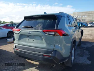 2021 Toyota RAV4 XLE with VIN 2T3W1RFV6MW163395, listed as a IAAI auction lot 42455461 with 65,840 mi miles and . Bid and sale history available at DreamBid. Image 4.