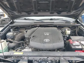 2015 Toyota Tacoma with VIN 3TMMU4FNXFM073978, listed as a IAAI auction lot 41935264 with 132,806 mi miles and . Bid and sale history available at DreamBid. Image 10.
