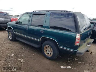 1997 Chevrolet Tahoe with VIN 1GNEK13R0VJ388887, listed as a Copart auction lot 64299984 with 179,683 mi miles and Clean Title. Bid and sale history available at carsss.com. Image 2.