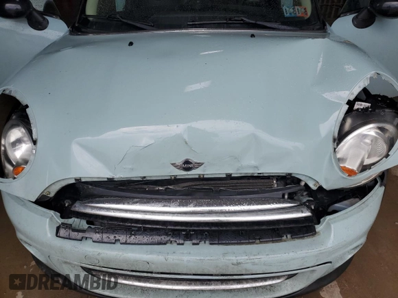 2012 MINI Hardtop with VIN WMWSU3C55CT541969, listed as a Copart auction lot 60988325 with 44,770 mi miles and Salvage title. Bid and sale history available at DreamBid. Image 11.
