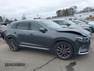 2016 Mazda CX-9 Grand Touring with VIN JM3TCADY4G0111310, listed as a IAAI auction lot 41532851 with 178,907 mi miles and . Bid and sale history available at DreamBid. Image 13.