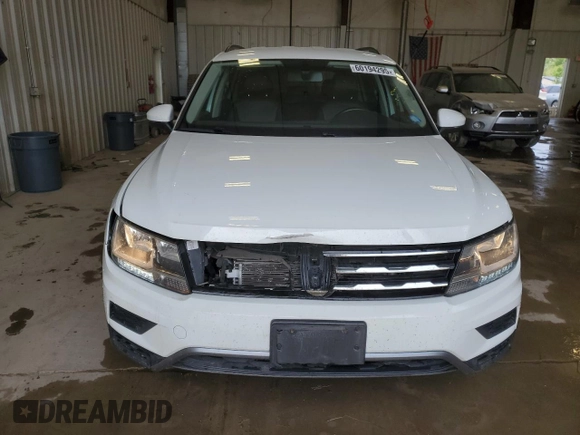 2018 Volkswagen Tiguan SEL z VIN 3VV2B7AX9JM182885, wystawiony jako Copart lot #60194295 z przebiegiem 101 861 mil mil oraz Czysty tytuł • Clean title. Historia ofert i sprzedaży dostępna na DreamBid. Obrazek 5.
