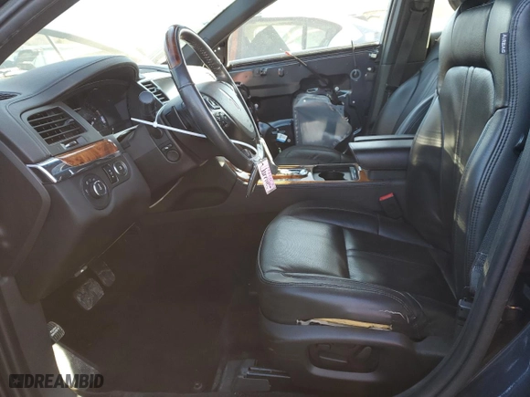 2014 Lincoln MKS with VIN 1LNHL9DK8EG604464, listed as a Copart auction lot 82766134 with 124,591 mi miles and Salvage Title. Bid and sale history available at carsss.com. Image 7.