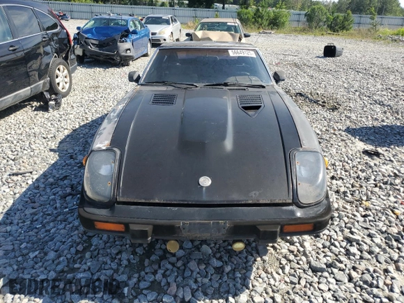 1982 Datsun 280ZX z VIN JN1HZ04S1CX447813, wystawiony jako Copart lot #56649125 z przebiegiem 285 290 mil mil oraz Tytuł czysty. Historia ofert i sprzedaży dostępna na DreamBid. Obrazek 5.