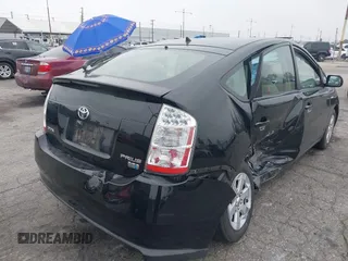 2009 Toyota Prius with VIN JTDKB20U693523309, listed as a IAAI auction lot 41885061 with 136,916 mi miles and . Bid and sale history available at DreamBid. Image 6.