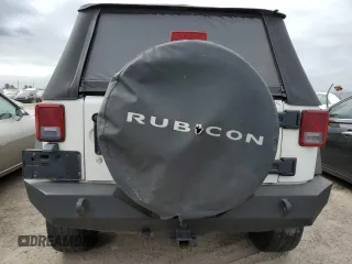 2009 Jeep Wrangler Rubicon with VIN 1J4GA64149L707142, listed as a Copart auction lot 76387344 with Not Provided miles and Salvage Title. Bid and sale history available at DreamBid. Image 6.