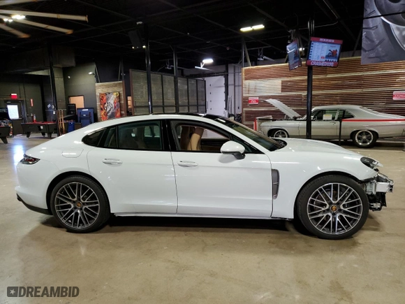 2022 Porsche Panamera with VIN WP0AJ2A75NL102179, listed as a Copart auction lot 58626814 with 7,100 mi miles and Salvage Title. Bid and sale history available at carsss.com. Image 1.