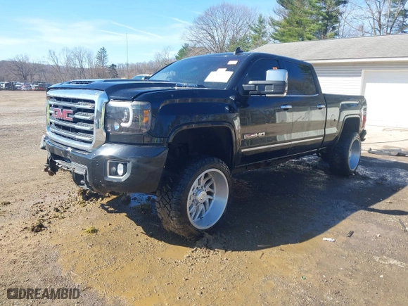 2017 GMC Sierra 2500HD SLT with VIN 1GT12TEY5HF249272, listed as a IAAI auction lot 41854590 with 134,866 mi miles. Bid and sale history available at carsss.com. Image 2.