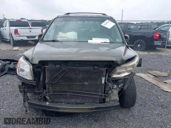 2006 Honda Pilot EX-L with VIN 5FNYF18776B011211, listed as a IAAI auction lot 39555749 with 295,998 mi miles and . Bid and sale history available at DreamBid. Image 13.