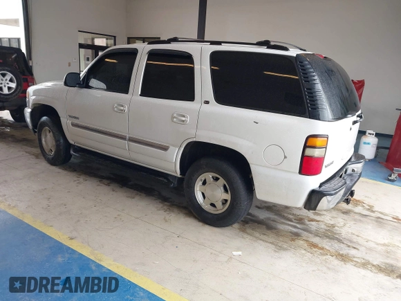 2004 GMC Yukon SLE z VIN 1GKEC13V64R107506, wystawiony jako IAAI lot #41407353 z przebiegiem 215 127 mil mil oraz . Historia ofert i sprzedaży dostępna na DreamBid. Obrazek 3.