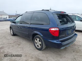 2005 Dodge Caravan SXT with VIN 2D4GP44L75R114843, listed as a IAAI auction lot 41644975 with 128,767 mi miles and . Bid and sale history available at DreamBid. Image 3.