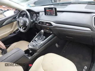 2019 Mazda CX-9 Touring with VIN JM3TCBCY6K0334898, listed as a IAAI auction lot 42467677 with 69,454 mi miles and . Bid and sale history available at DreamBid. Image 5.