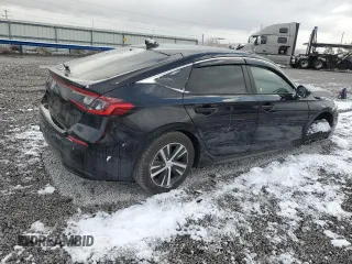 2022 Honda Civic LX z VIN 19XFL2H58NE005054, wystawiony jako Copart lot #80970294 z przebiegiem 65 073 mil mil oraz Szkoda całkowita • Salvage title. Historia ofert i sprzedaży dostępna na DreamBid. Obrazek 3.